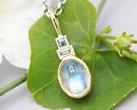 Gold pendant necklace with sapphire and Moonstone